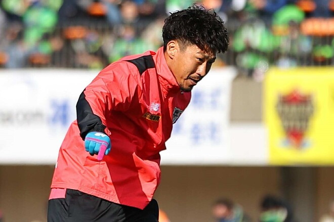 ツエーゲン金沢豊田陽平選手実着用サイン入りウーブンフーデジャケット